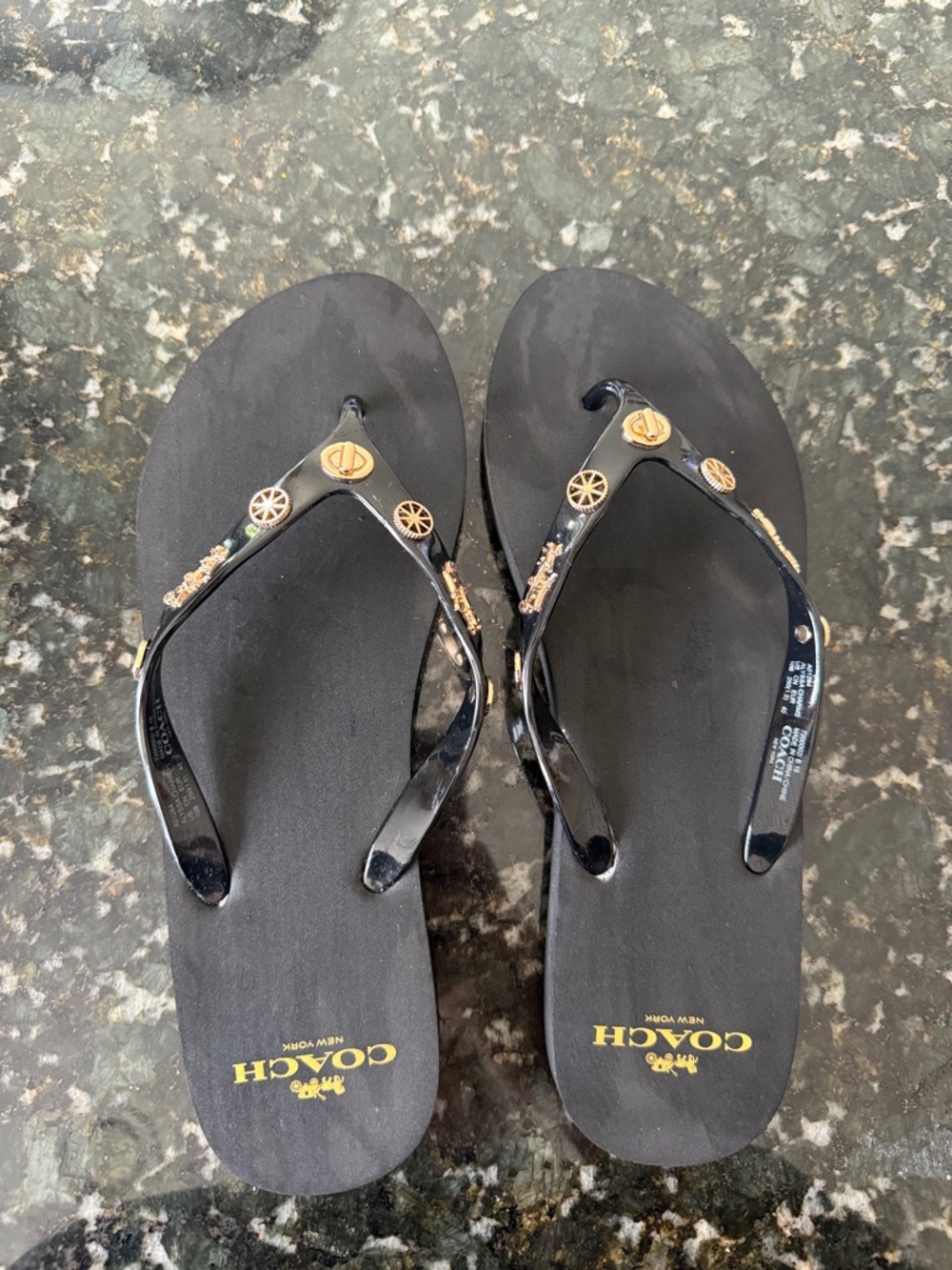 Coach Black Flip Flops with Gold Logo Accents